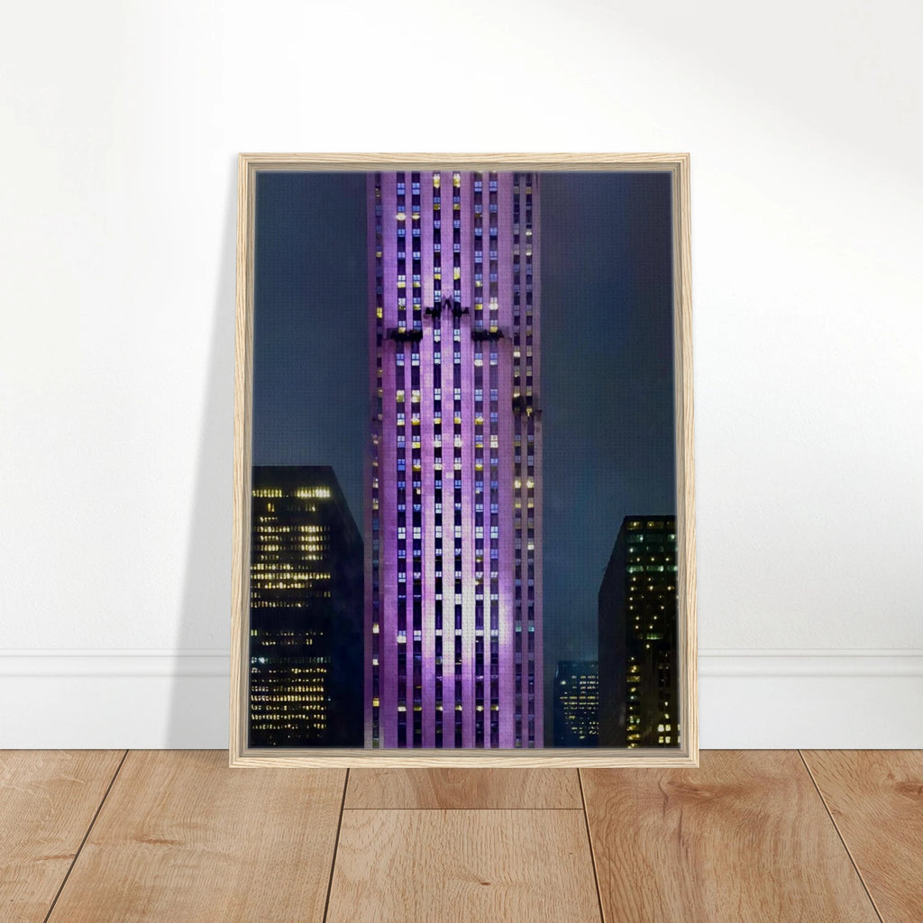 Framed canvas art of NYC holiday skyline in purple hues, from the Travel Collection Studio Edition, featuring vibrant cityscape details.