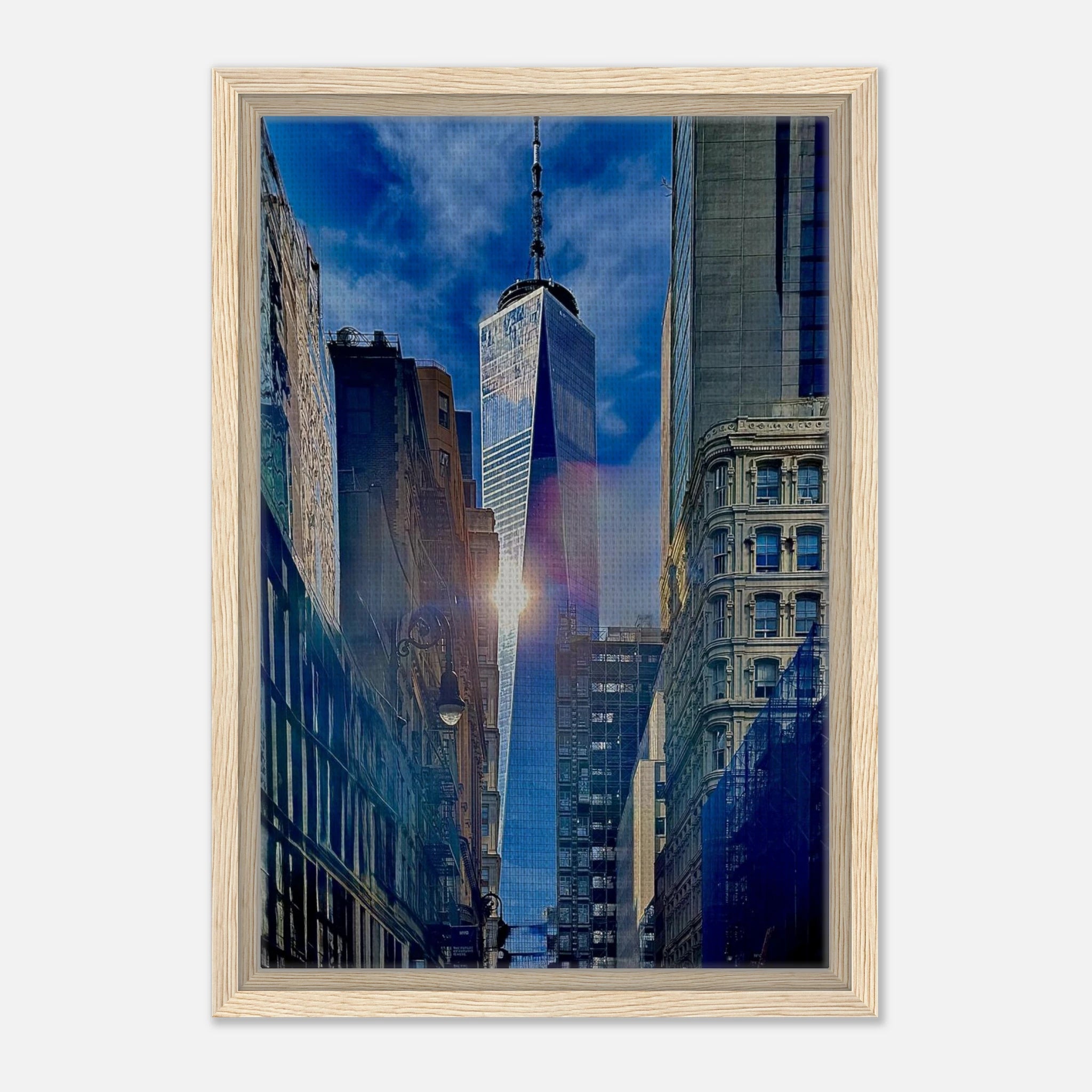 Framed canvas print of sunlight reflecting on One World Trade Center in NYC, part of the Travel Collection Studio Edition.