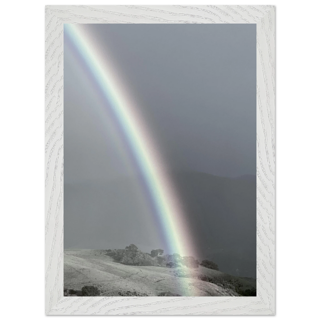 Black and white mounted framed poster of a rainbow after a summer storm from the California Central Coast travel collection, studio edition.
