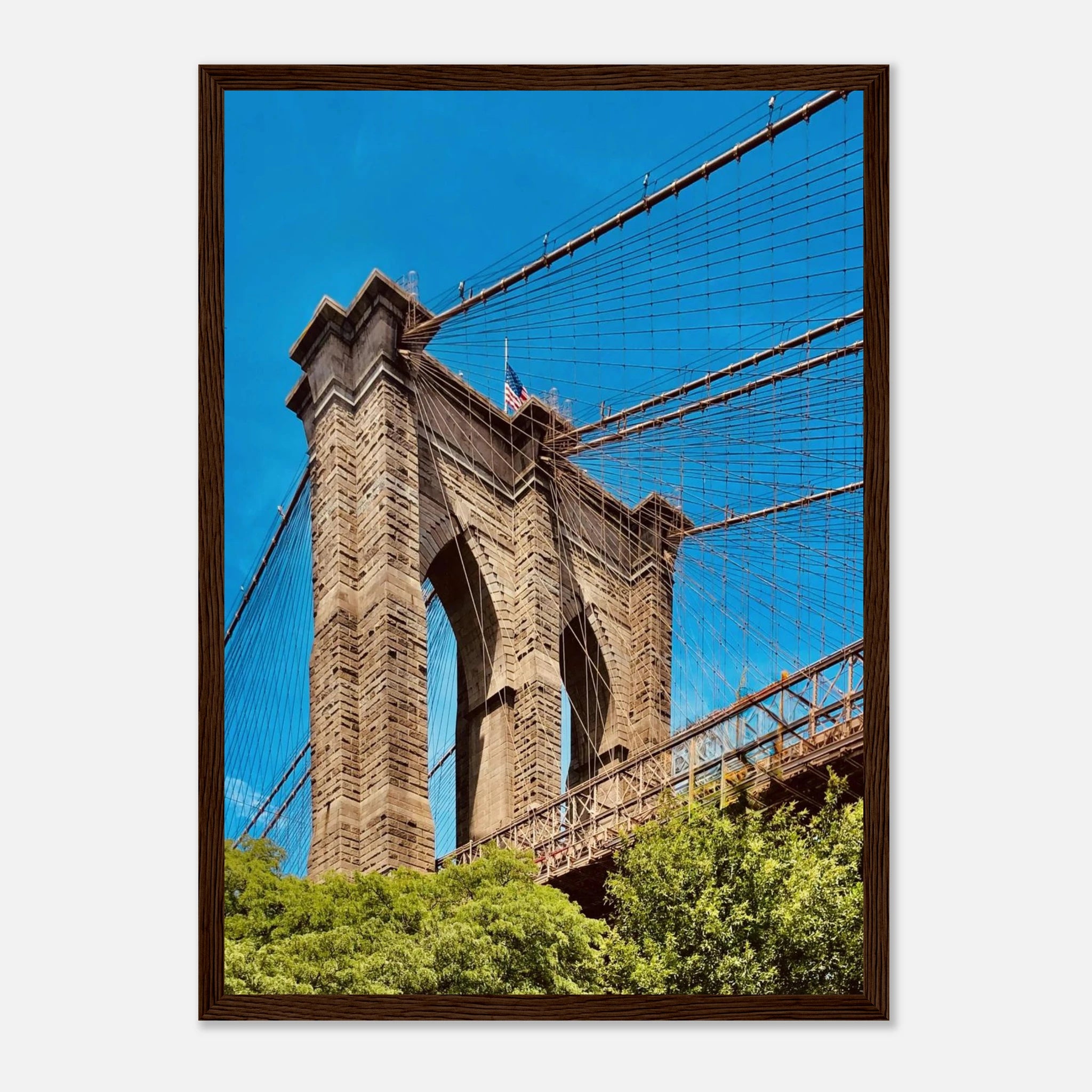 Framed NYC Brooklyn Bridge poster featuring a Dumbo view, showcasing a vibrant summer cityscape print from the Travel Collection.