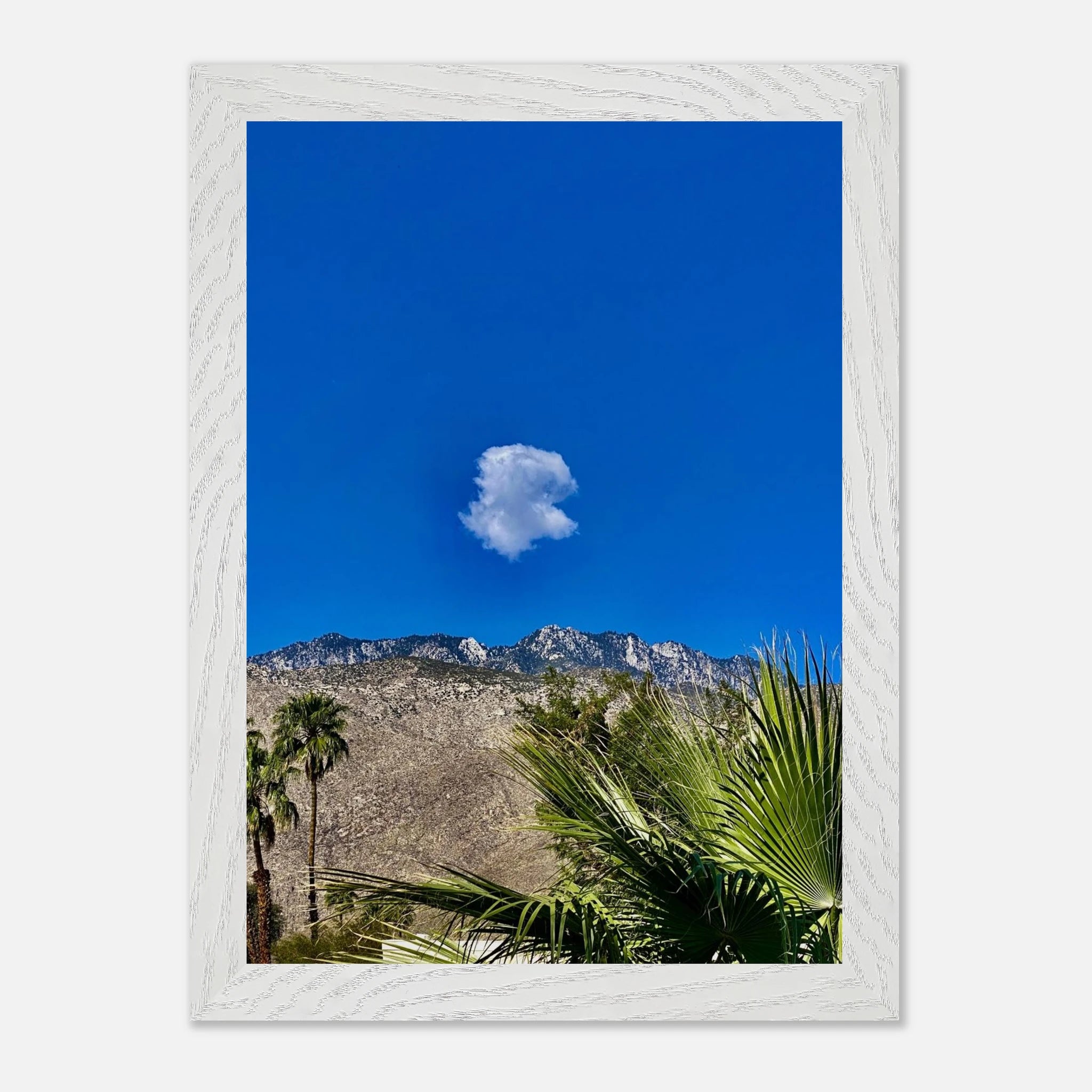 Palm Springs cloud mounted wooden framed poster featuring vibrant California art in a stylish home decor setting.