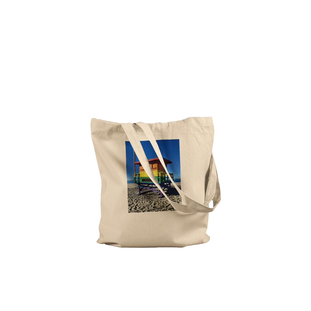 Eco-friendly Pride 2025 tote bag with colorful print, supporting GLAAD, made from sustainable materials, perfect for summer accessories.