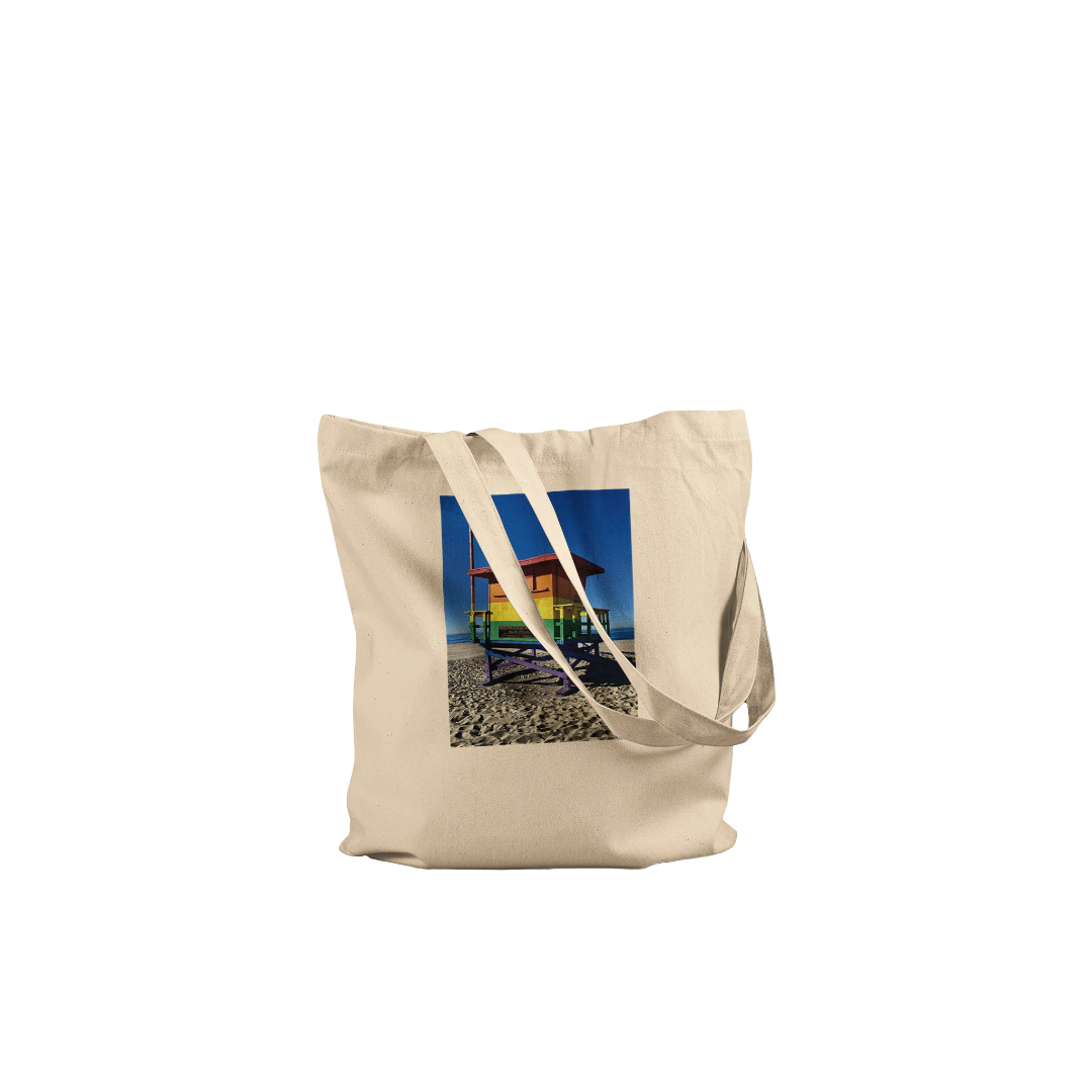 Eco-friendly Pride 2025 tote bag with colorful print, supporting GLAAD, made from sustainable materials, perfect for summer accessories.