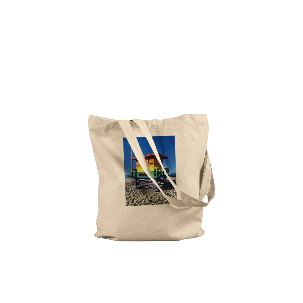 Eco-friendly Pride 2025 tote bag with colorful print, made from sustainable materials, supporting GLAAD.