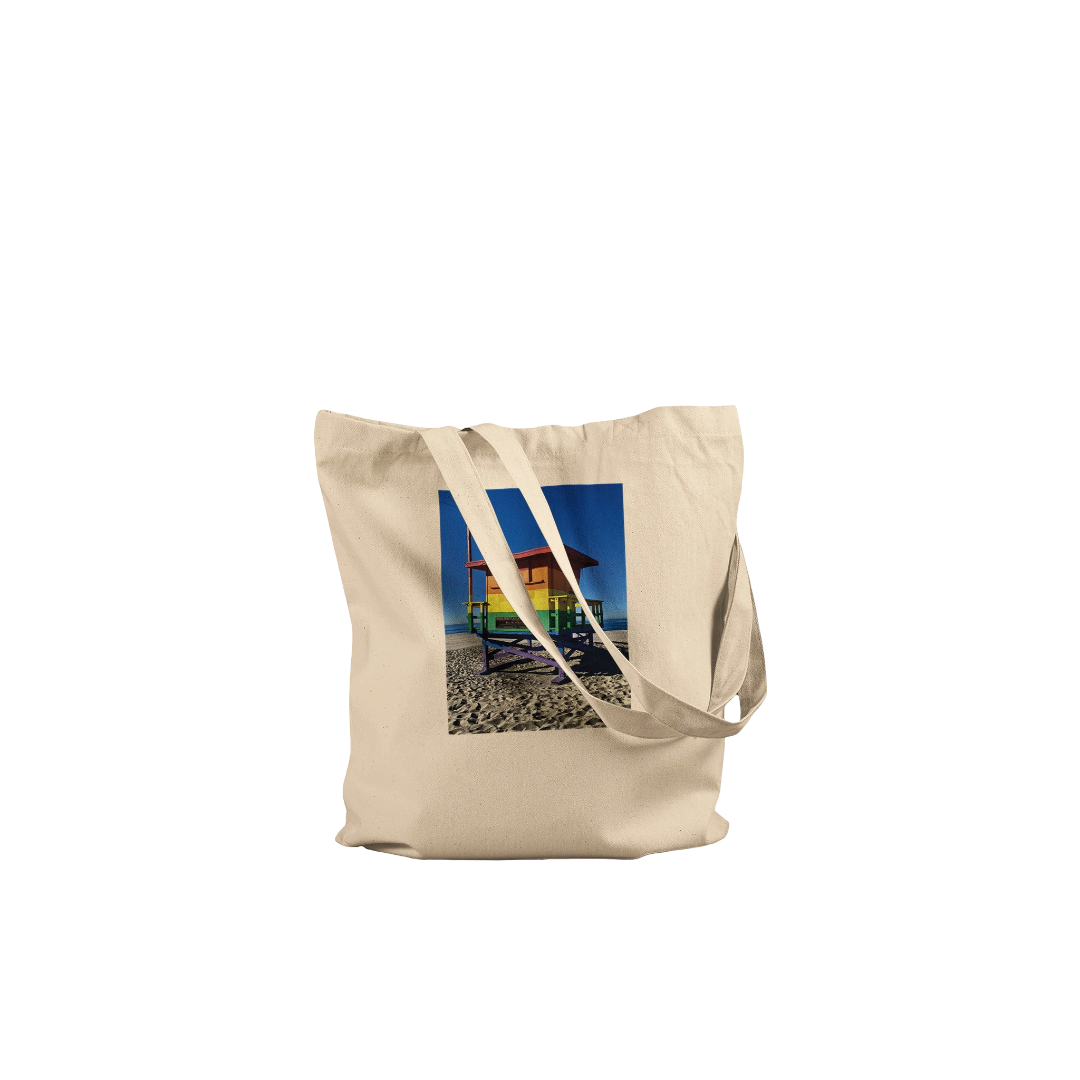 Eco-friendly Pride 2025 tote bag with colorful print, made from sustainable materials, supporting GLAAD.