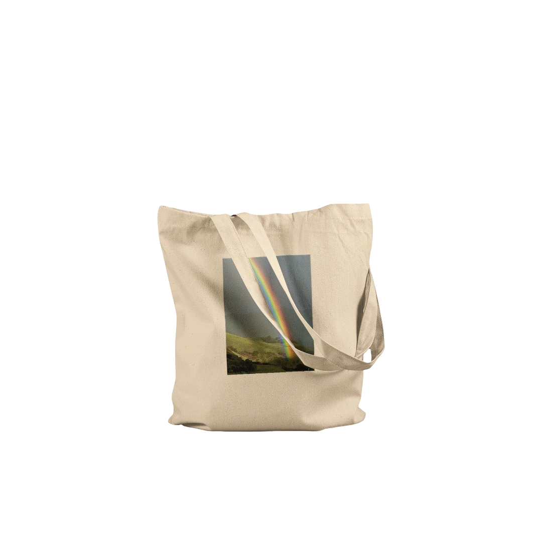 Colorful rainbow print summer tote bag made of cotton, eco-friendly, with adventure and summer vibes, perfect for casual outings.