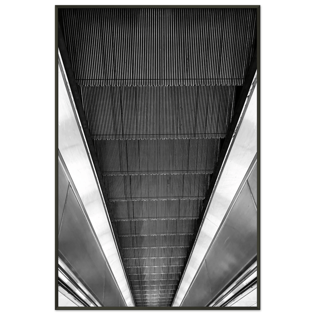 Black and white framed poster of London Tube escalator, abstract wall art print on high-quality material, part of travel collection.
