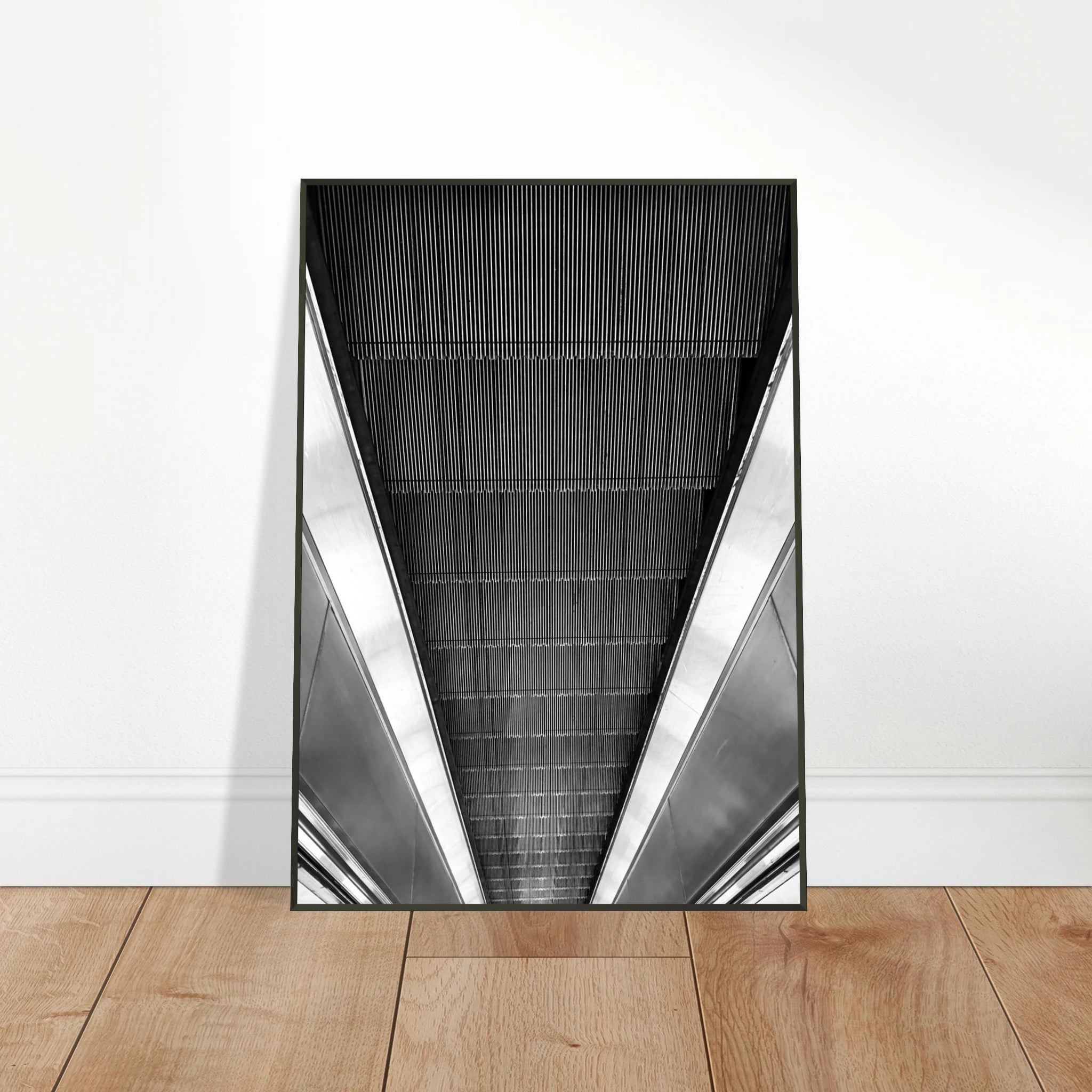 Black and white framed poster of London Tube escalator abstract print from the Travel Collection Studio Edition.