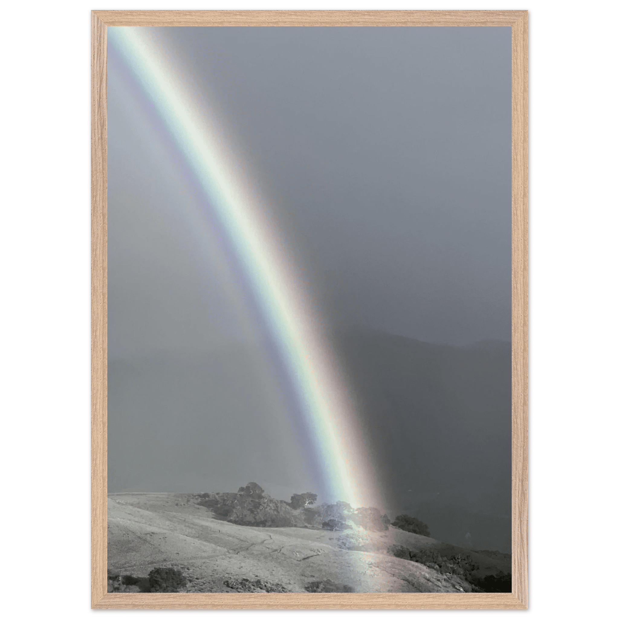 Black and white mounted framed poster of a rainbow after a summer storm in California Central Coast, part of the Black & White Travel Collection.