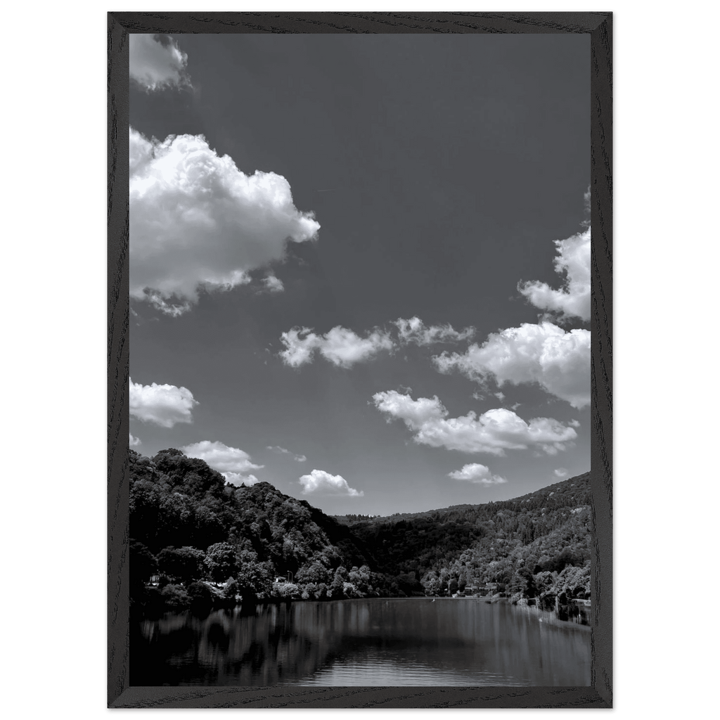 Black and white mounted framed poster of a German river view, 15x20 cm print with white frame from the Black & White Travel Collection.