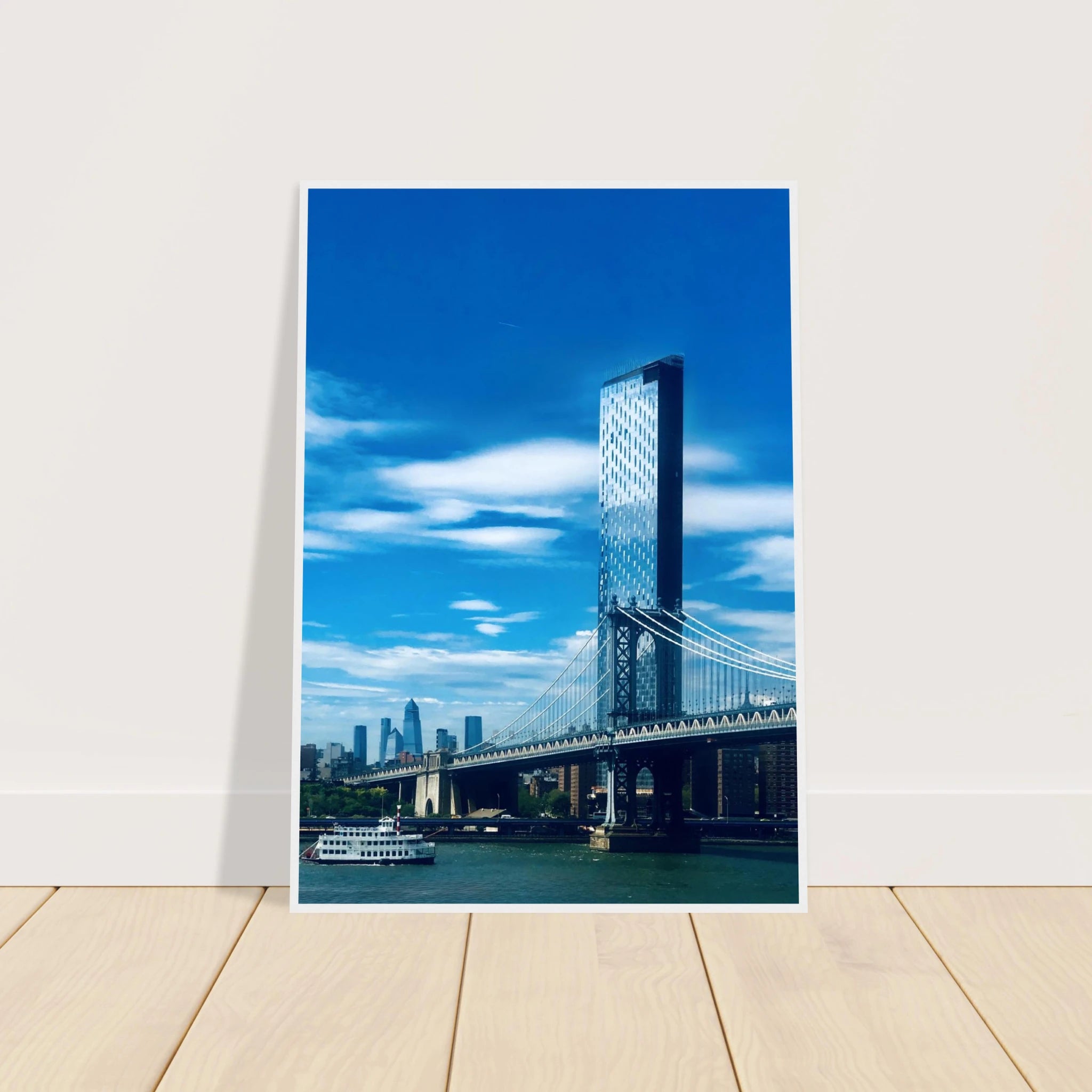 Framed NYC Manhattan Bridge and East River urban photography print in white frame, 15x20 cm, part of travel collection studio edition.