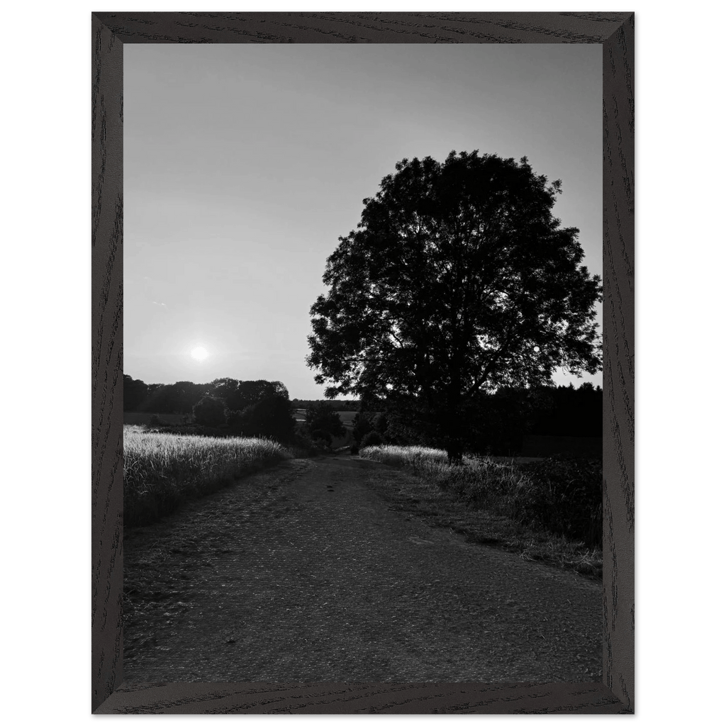 Black and white framed poster of the Cotswolds summer scene, English countryside wall art in a 15x20 cm wooden frame.