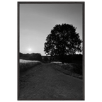 Black and white framed poster of Cotswolds summer landscape, English countryside wall art on print material with wooden frame.