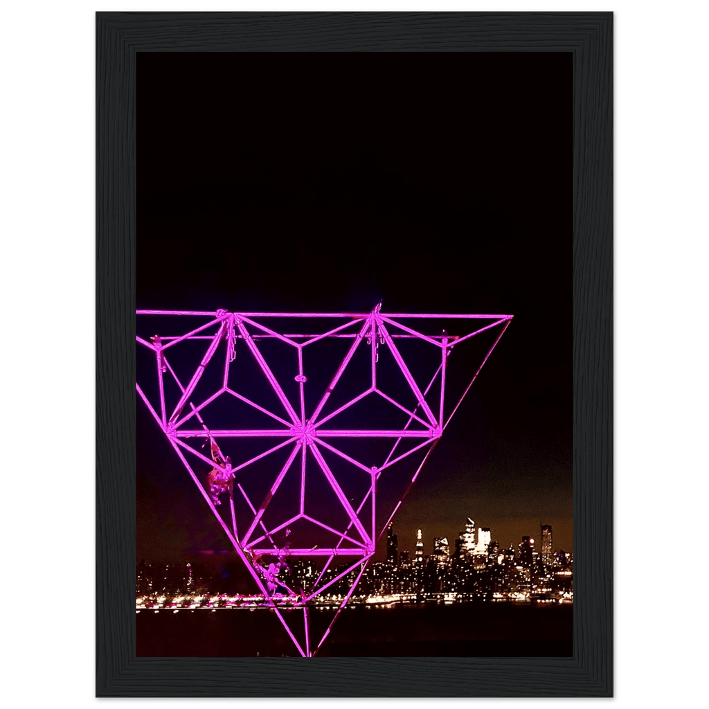 Framed New York City holiday art poster featuring a vibrant Manhattan night view with Empire State Building, part of travel collection.