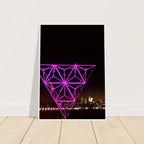 Framed New York City holiday art print showing a vibrant Manhattan night view with Empire State Building in purple hues.