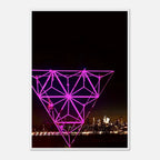 Framed New York City holiday art poster featuring a stunning Manhattan night view with Empire State Building, in purple tones.