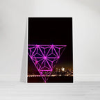 Framed New York City holiday art print featuring Manhattan night view with Empire State Building in purple tones, part of Travel Collection.