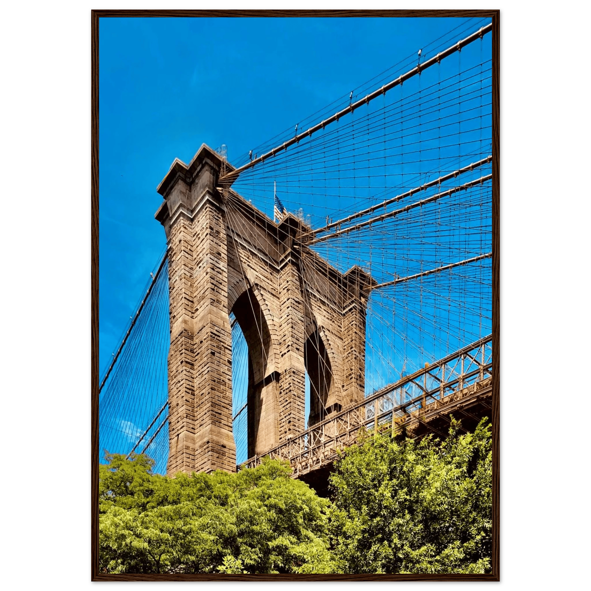 Framed NYC Brooklyn Bridge poster featuring a Dumbo view, 15x20 cm print with white frame, part of the Travel Collection studio edition.