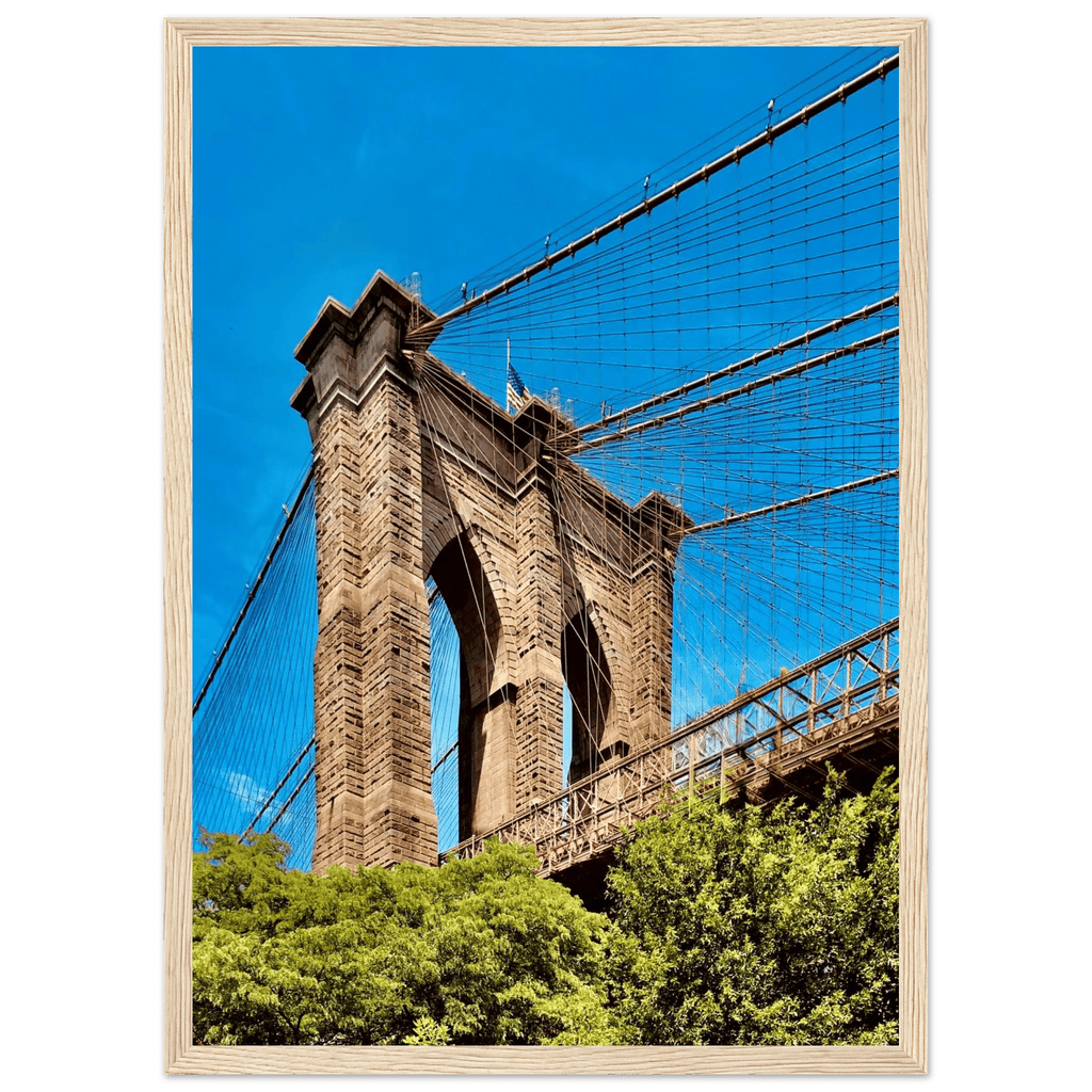 Framed NYC Brooklyn Bridge poster in white frame, featuring a stunning Dumbo view from the Studio Edition print collection.