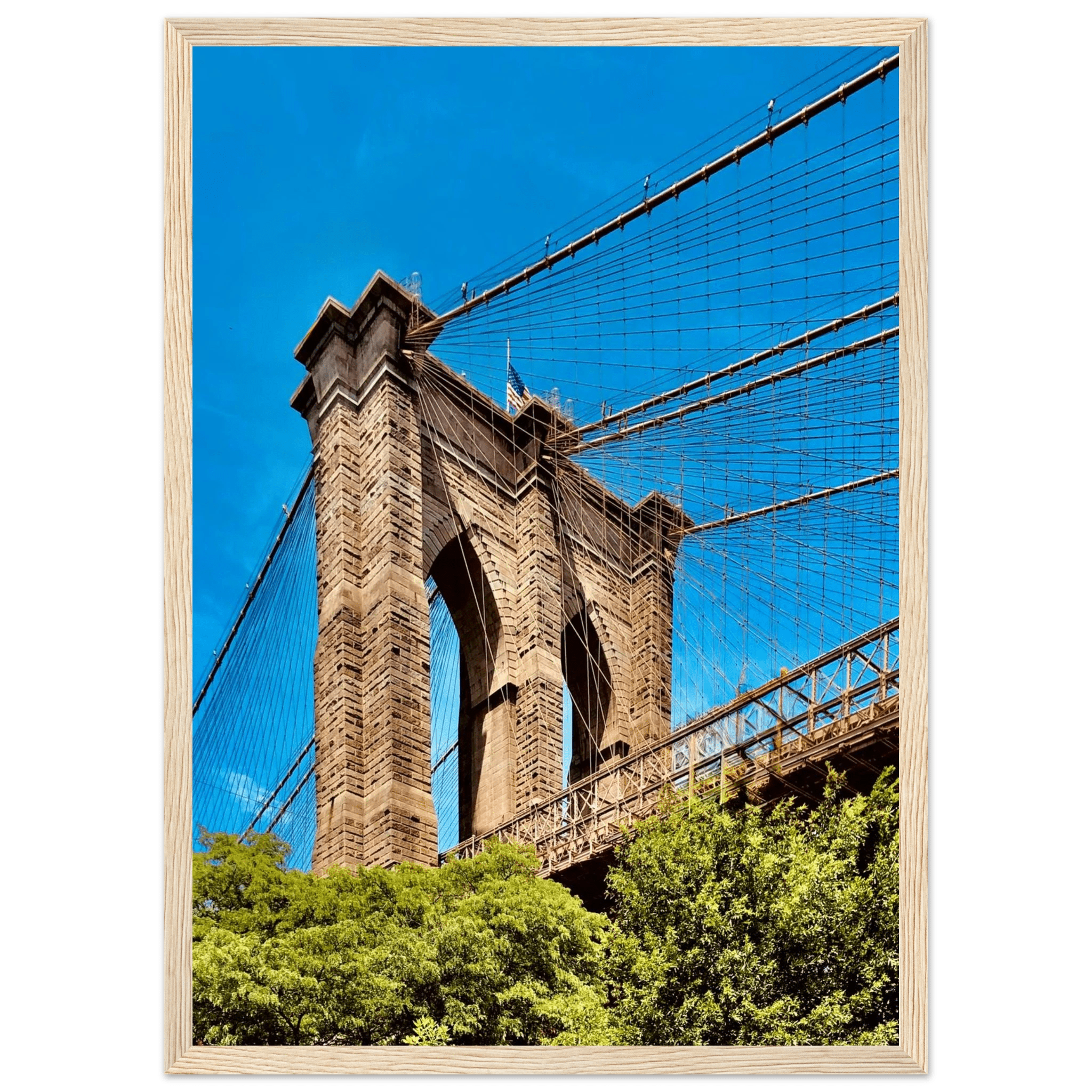 Framed NYC Brooklyn Bridge poster in white frame, featuring a stunning Dumbo view from the Studio Edition print collection.