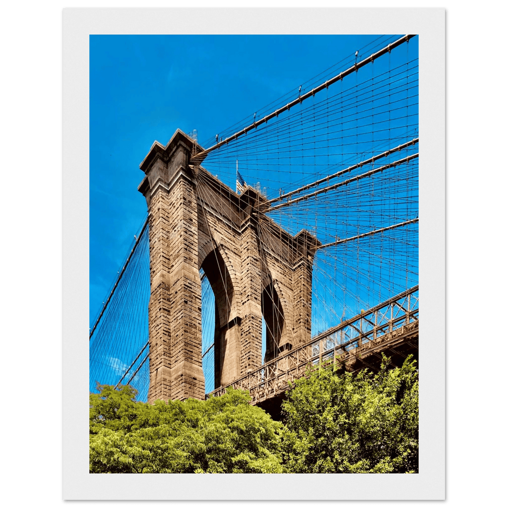 Framed NYC Brooklyn Bridge poster featuring a Dumbo view, 15x20 cm print with white frame, part of travel collection studio edition