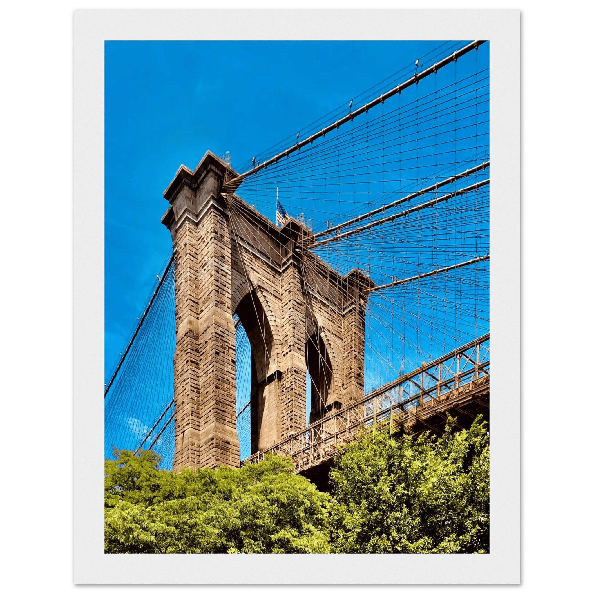 Framed NYC Brooklyn Bridge poster featuring a Dumbo view, 15x20 cm print with white frame, part of travel collection studio edition