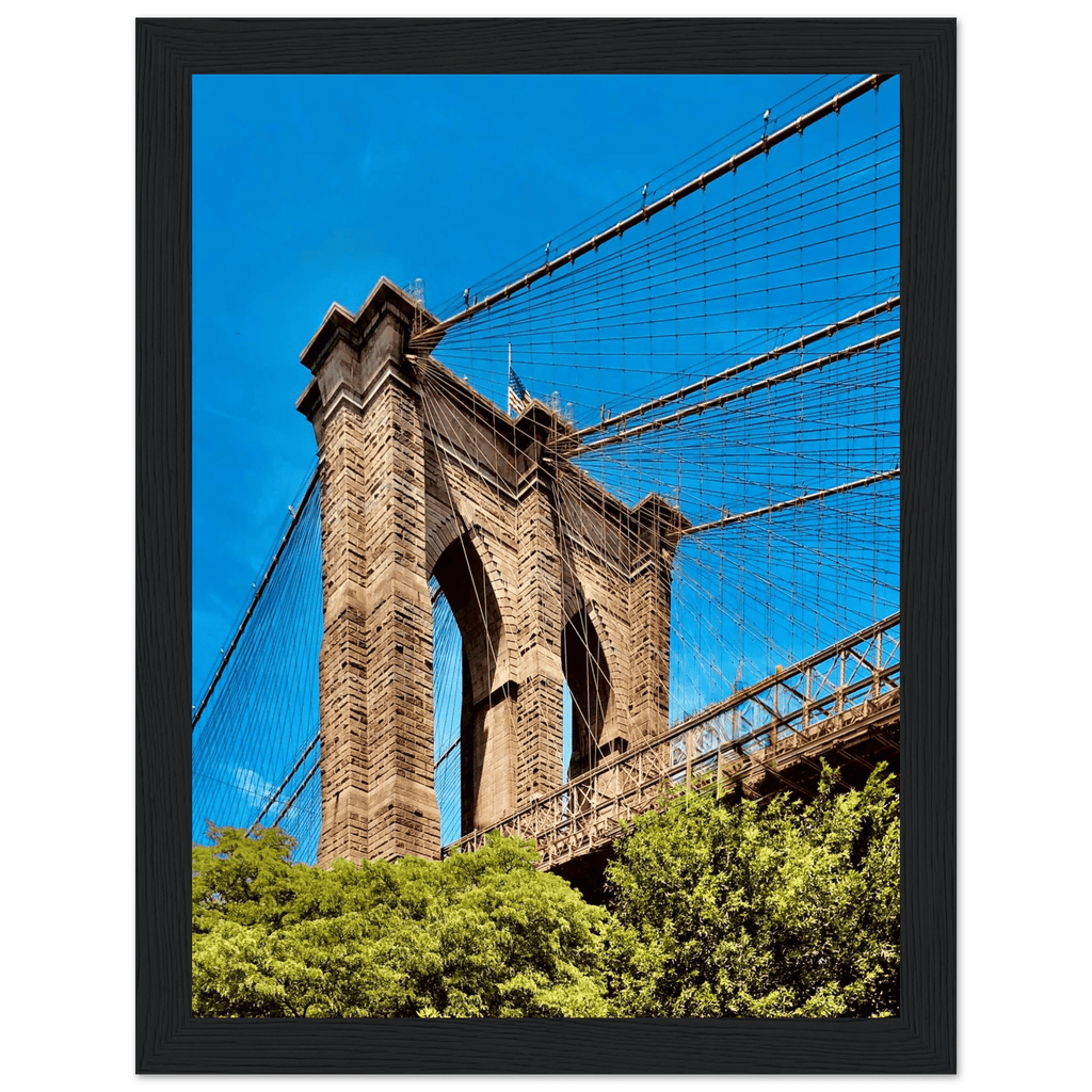 Framed NYC Brooklyn Bridge poster featuring Dumbo view, 15x20 cm print with white frame, part of travel collection studio edition.