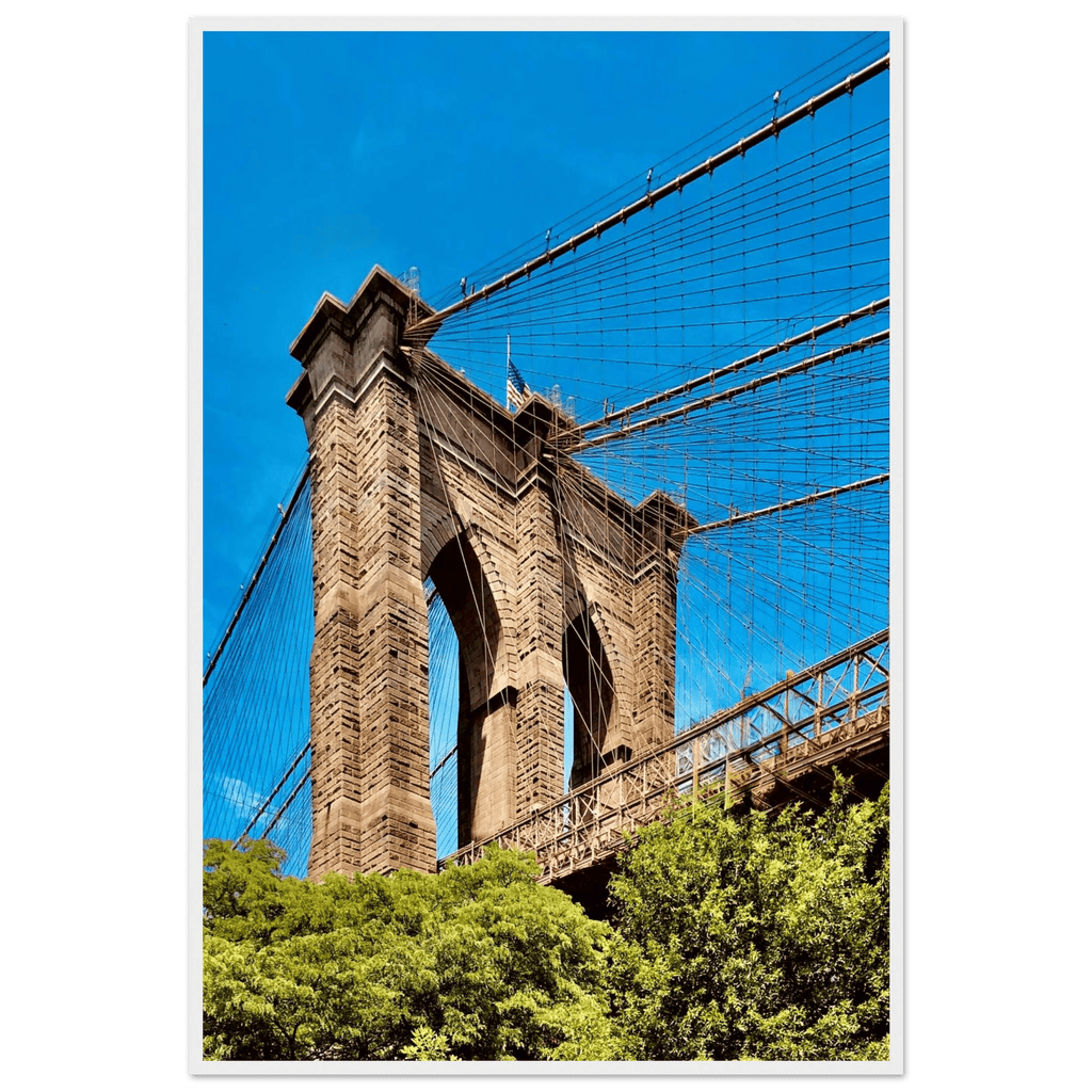 Framed NYC Brooklyn Bridge poster featuring Dumbo view, 15x20 cm print with white frame, part of travel collection studio edition.
