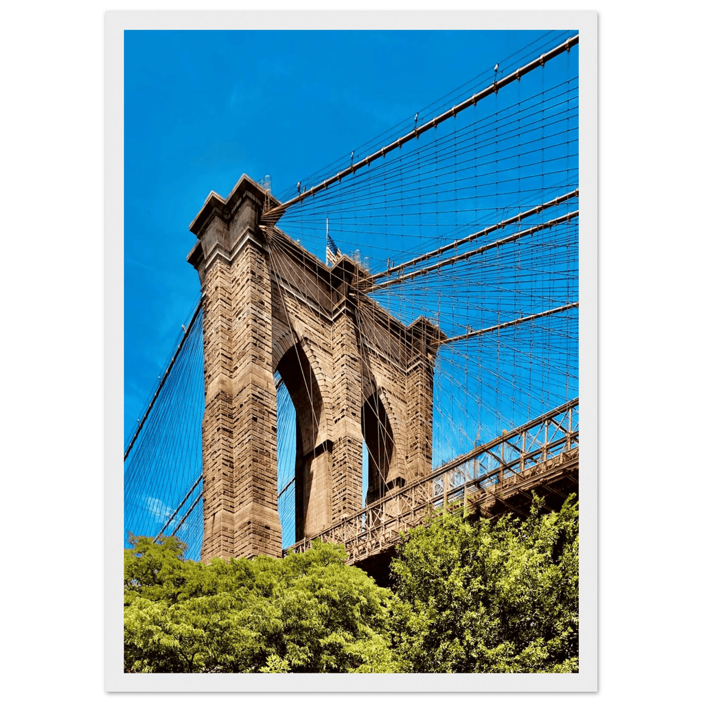 Framed NYC Brooklyn Bridge poster featuring a Dumbo view, 15x20 cm print with white frame, part of the Studio Edition travel collection.