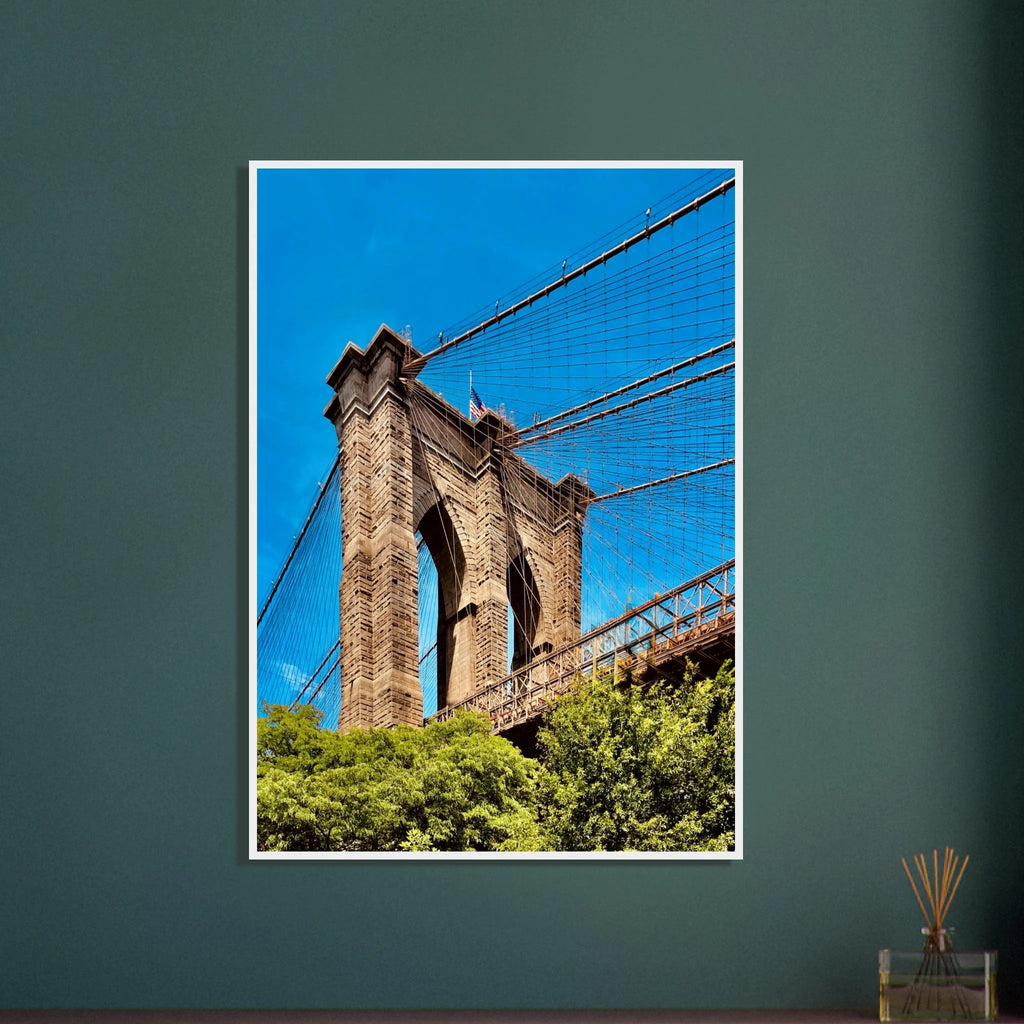 Framed print of the NYC Brooklyn Bridge with Dumbo view, 15x20 cm, white frame, from the Studio Edition travel collection.