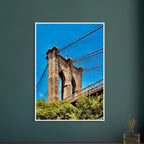 Framed print of the NYC Brooklyn Bridge with Dumbo view, 15x20 cm, white frame, from the Studio Edition travel collection.