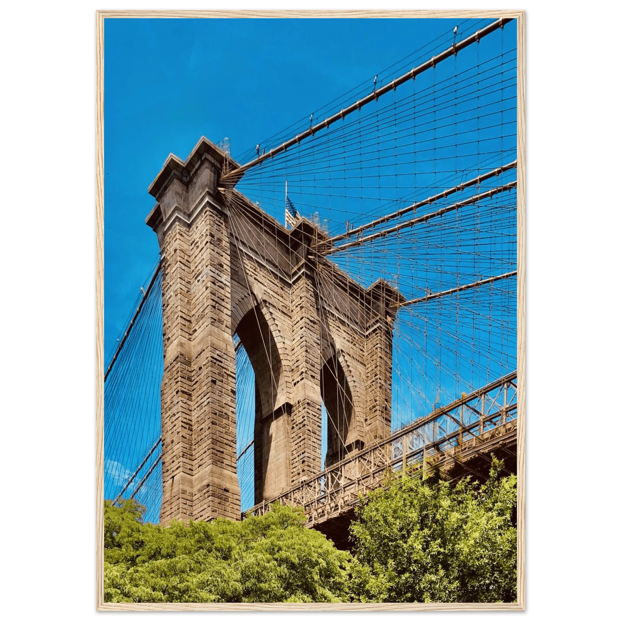 Framed NYC Brooklyn Bridge poster featuring a stunning Dumbo view, printed on high-quality material with a white frame.