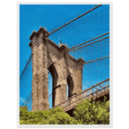 Framed NYC Brooklyn Bridge poster featuring Dumbo skyline view in white frame, part of travel collection print, studio edition.