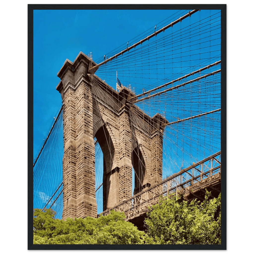Framed NYC Brooklyn Bridge poster featuring a Dumbo view, 15x20cm print with white frame, part of travel collection studio edition.