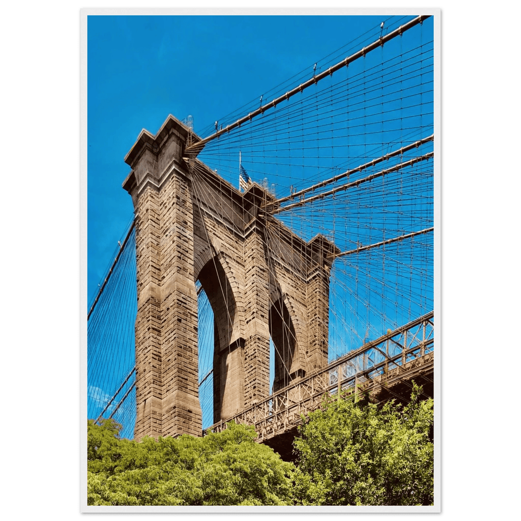 Framed NYC Brooklyn Bridge poster from My Store featuring a stunning Dumbo view, 15x20 cm print with a white frame.