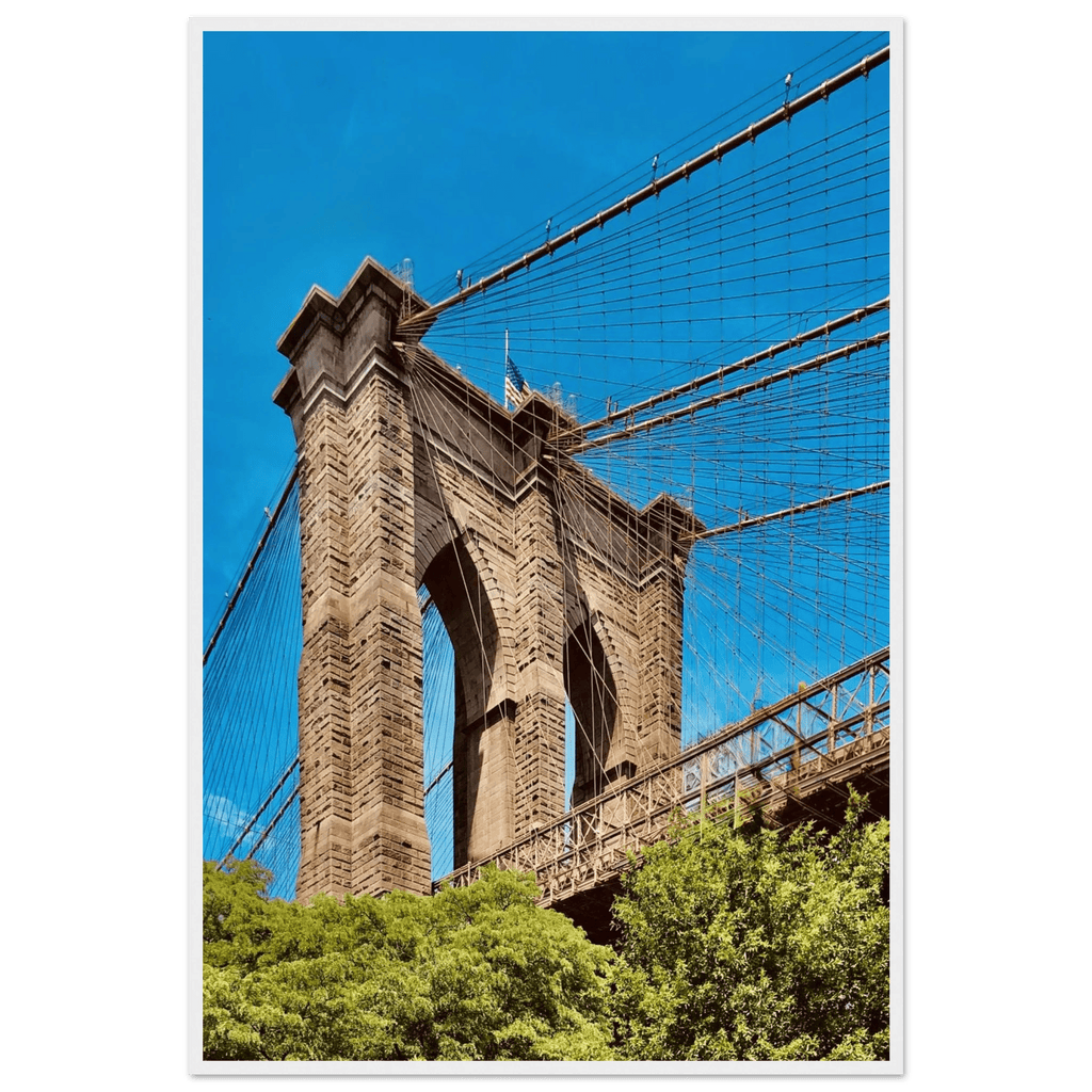 Framed NYC Brooklyn Bridge poster featuring a Dumbo view, 15x20 cm print with white frame, part of the Studio Edition travel collection.