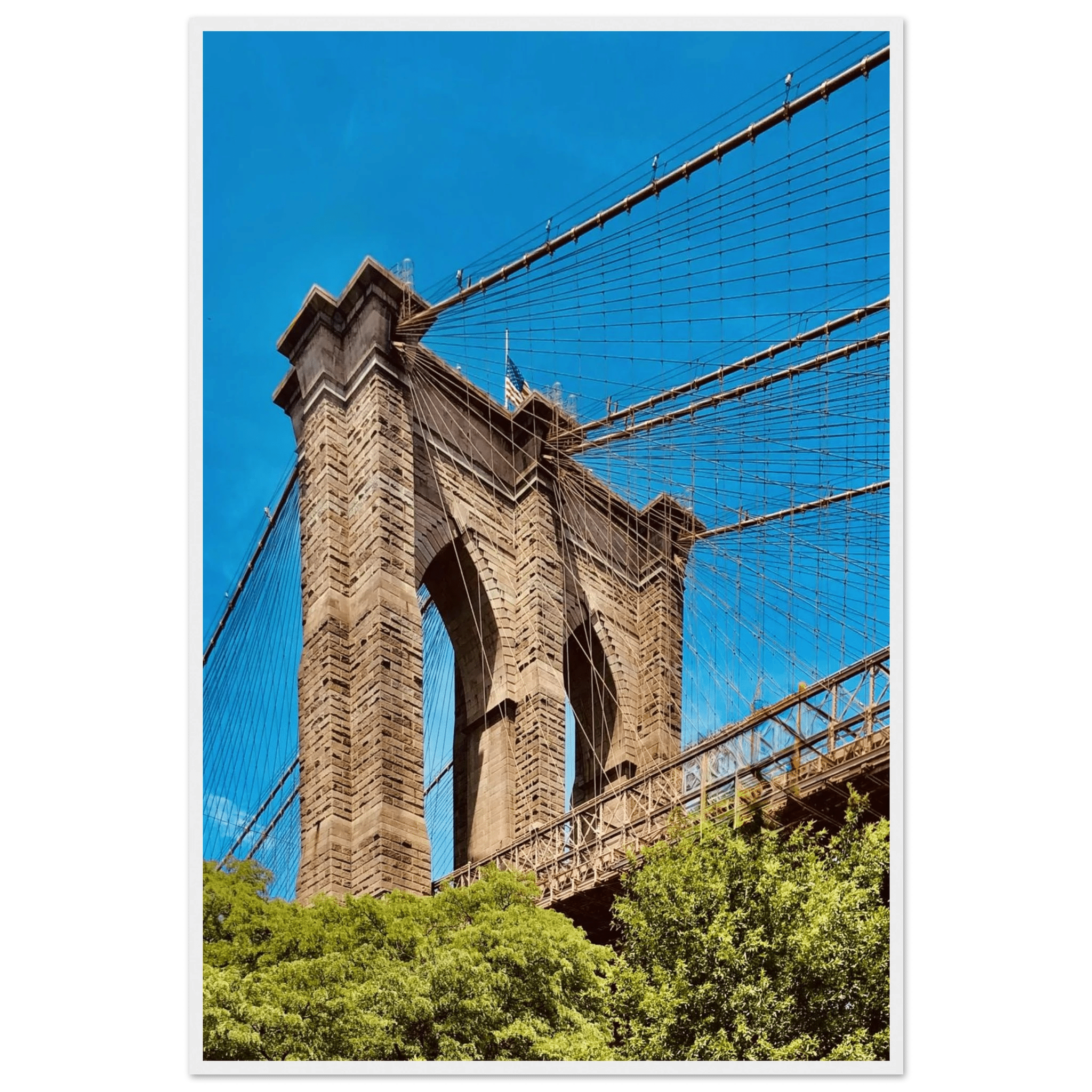 Framed NYC Brooklyn Bridge poster featuring a Dumbo view, 15x20 cm print with white frame, part of the Studio Edition travel collection.