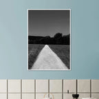 Black and white wooden framed poster of a summer road scene, part of the Timeless Chic Travel Collection, printed on semi-glossy paper.