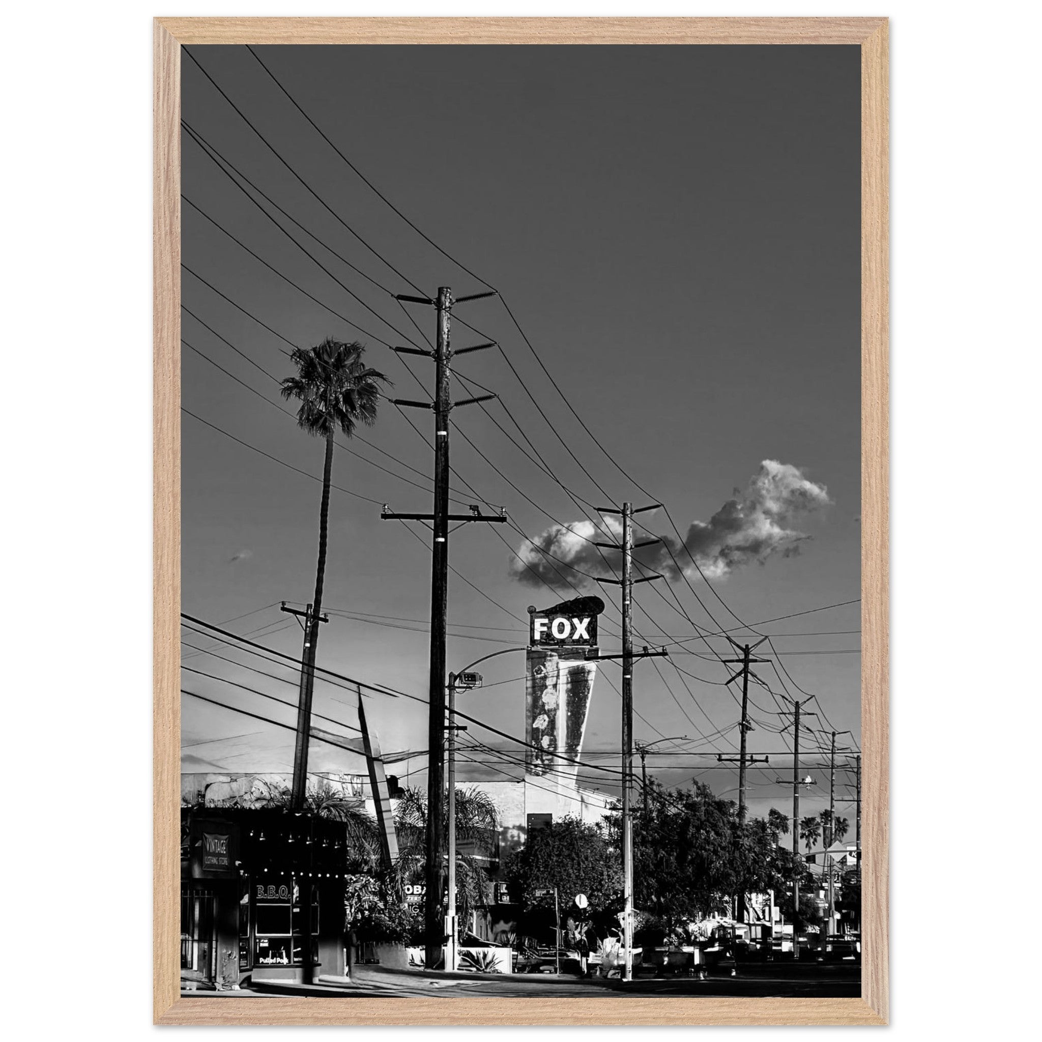 Natural wood-framed semi-glossy print of iconic LA Westside Road wall art in black and white, part of California poster art series.
