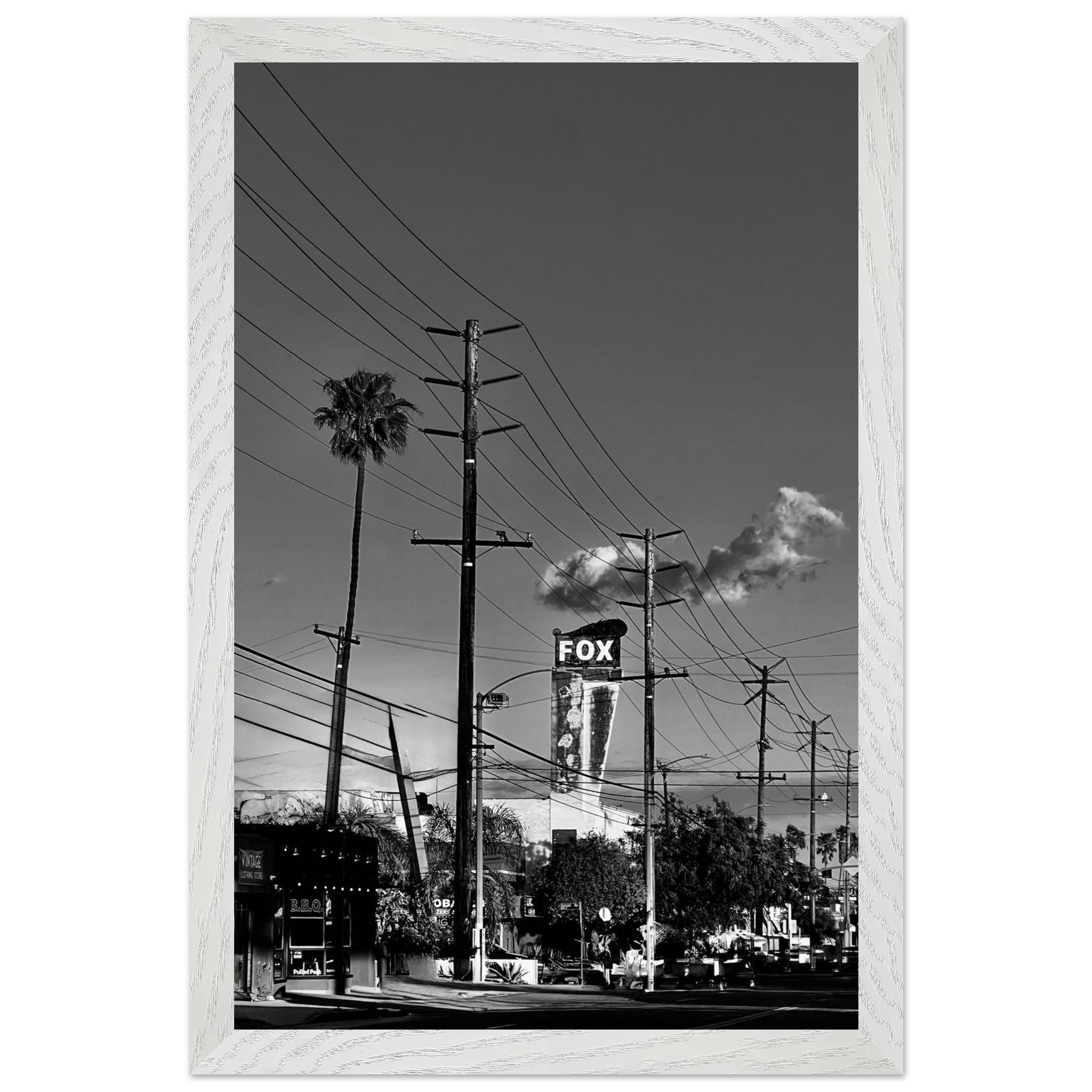 Natural wood-framed semi-glossy poster of iconic LA Westside Road, black and white California wall art print.