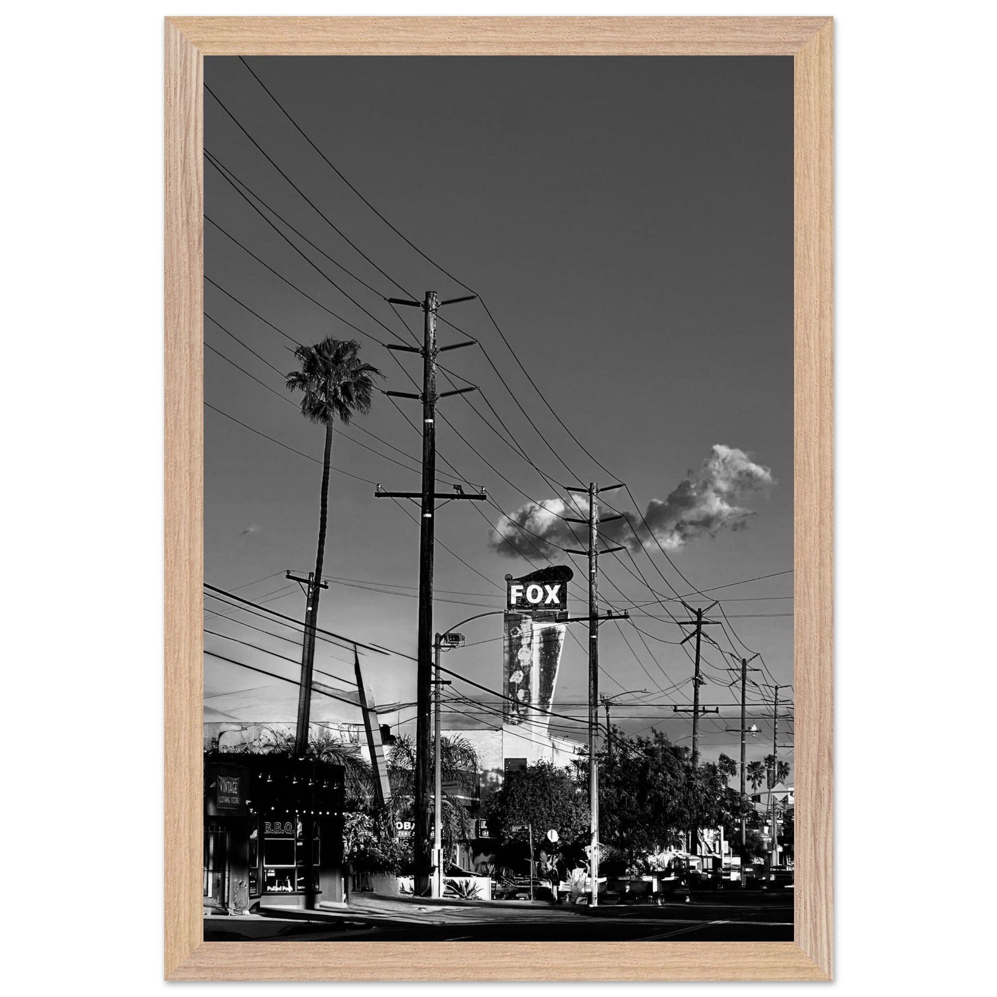 Natural wood-framed semi-glossy poster of iconic LA Westside Road, black and white California wall art print, studio edition.