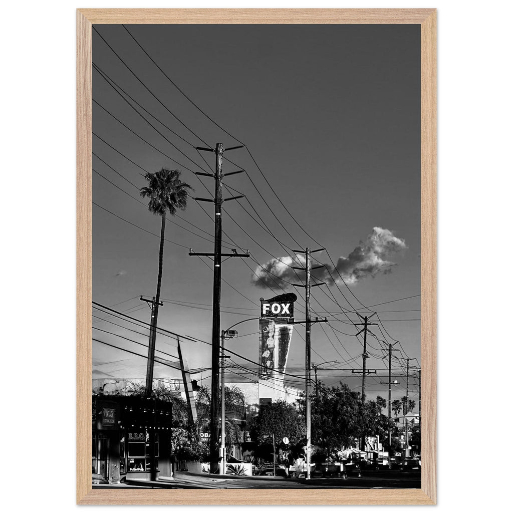 Natural wood-framed semi-glossy poster of iconic LA Westside Road, elegant black and white California wall art print.