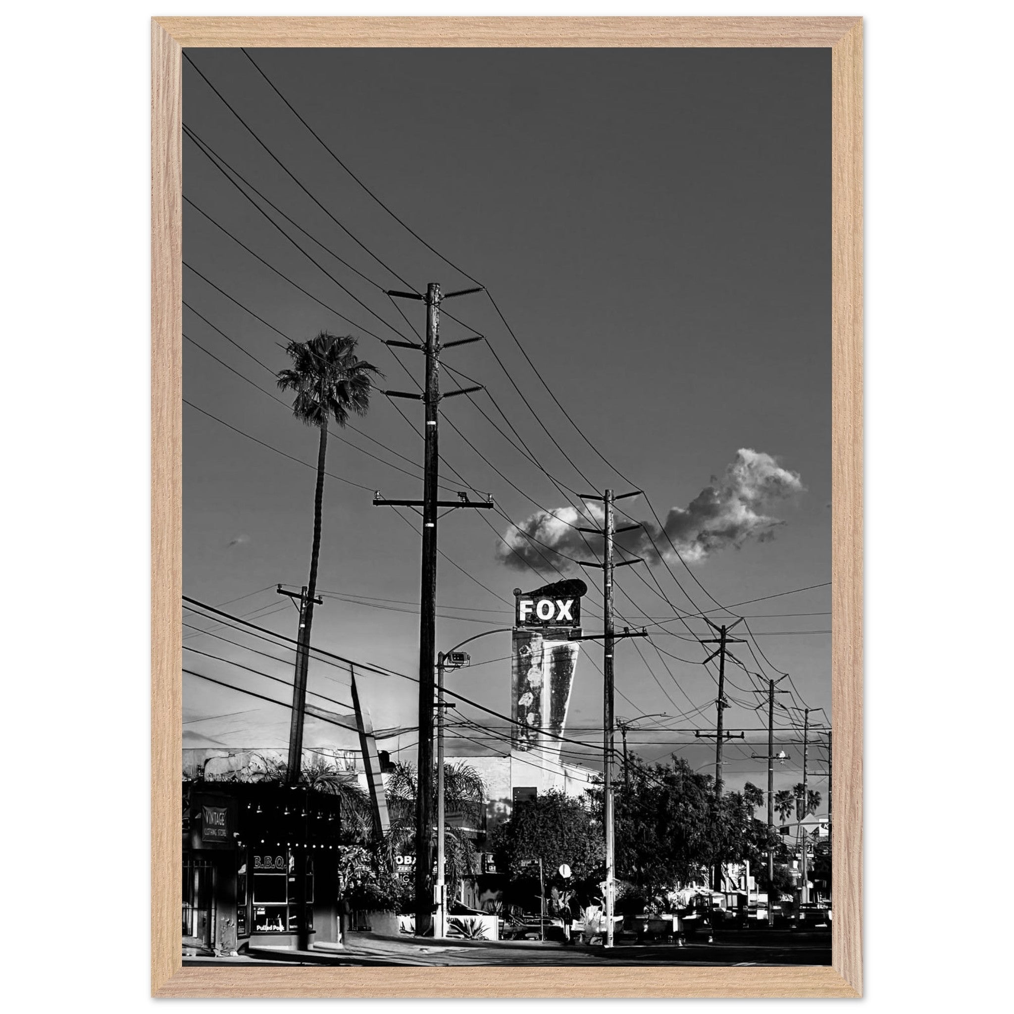 Natural wood-framed semi-glossy poster of iconic LA Westside Road, elegant black and white California wall art print.