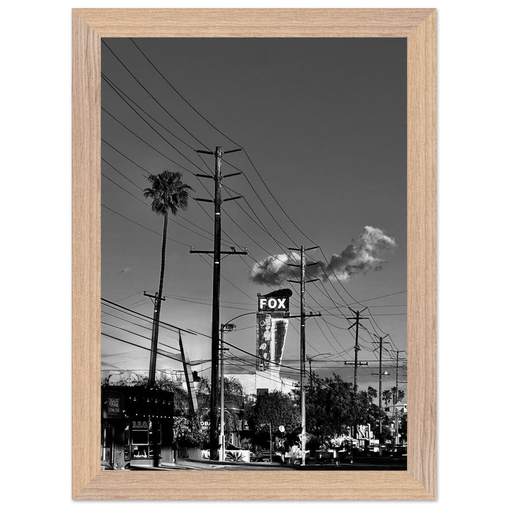 Natural wood-framed semi-glossy poster of iconic LA Westside Road, elegant black and white California wall art print.