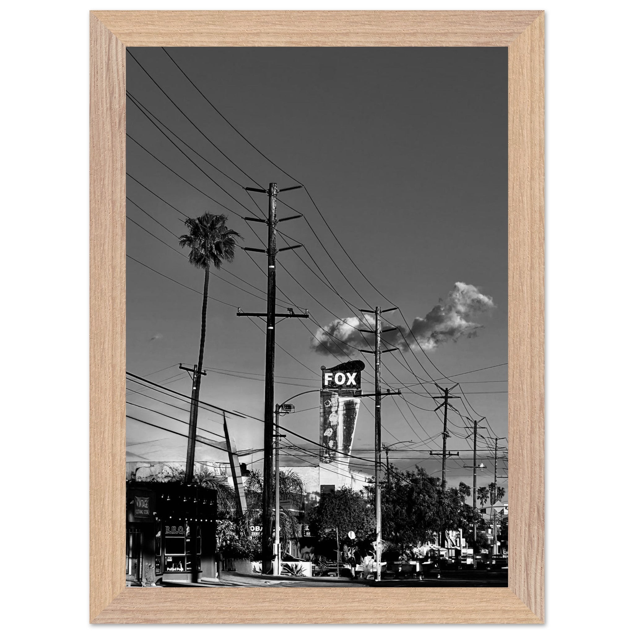 Natural wood-framed semi-glossy poster of iconic LA Westside Road, elegant black and white California wall art print.