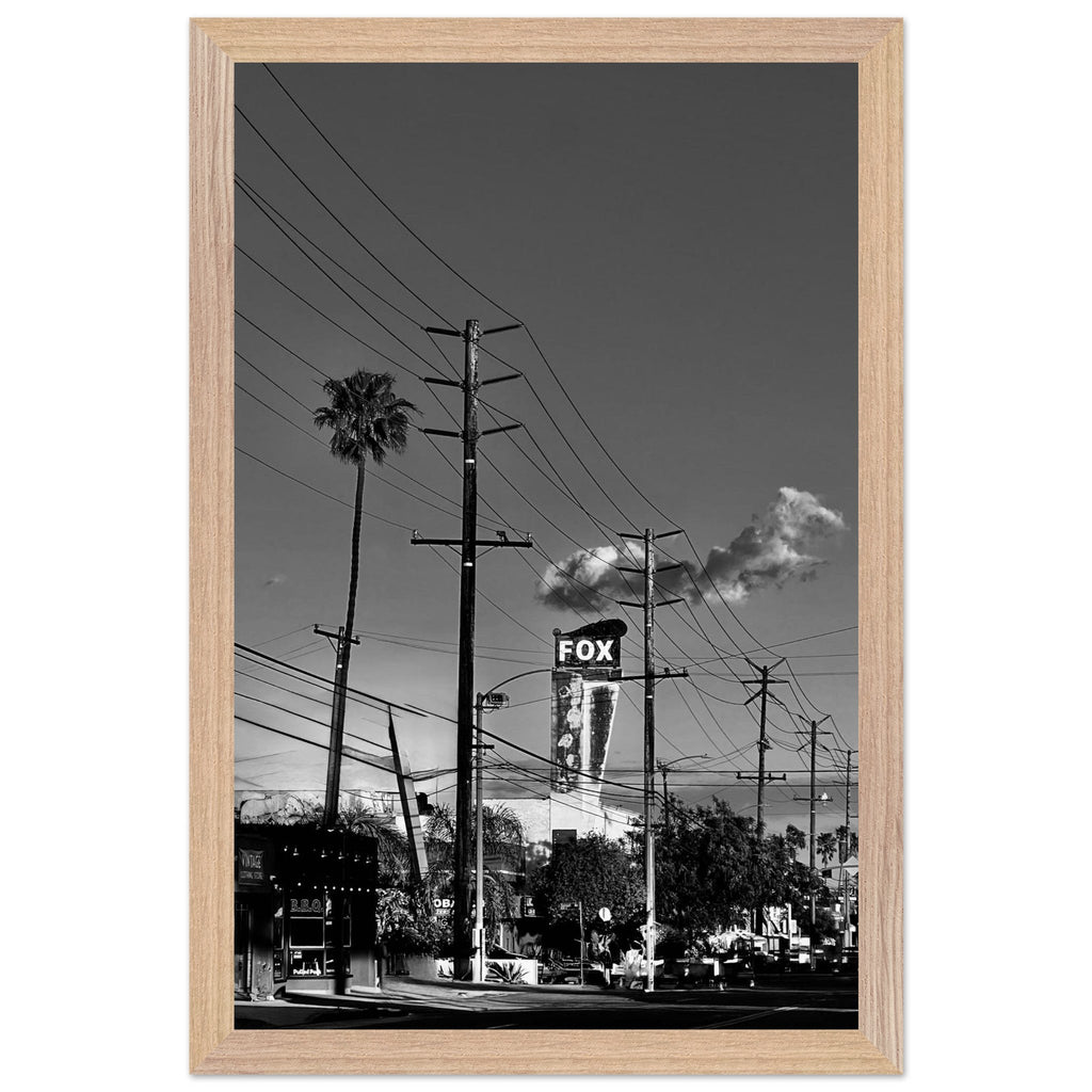 Natural wood-framed semi-glossy poster of iconic LA Westside Road, elegant black and white California wall art print.
