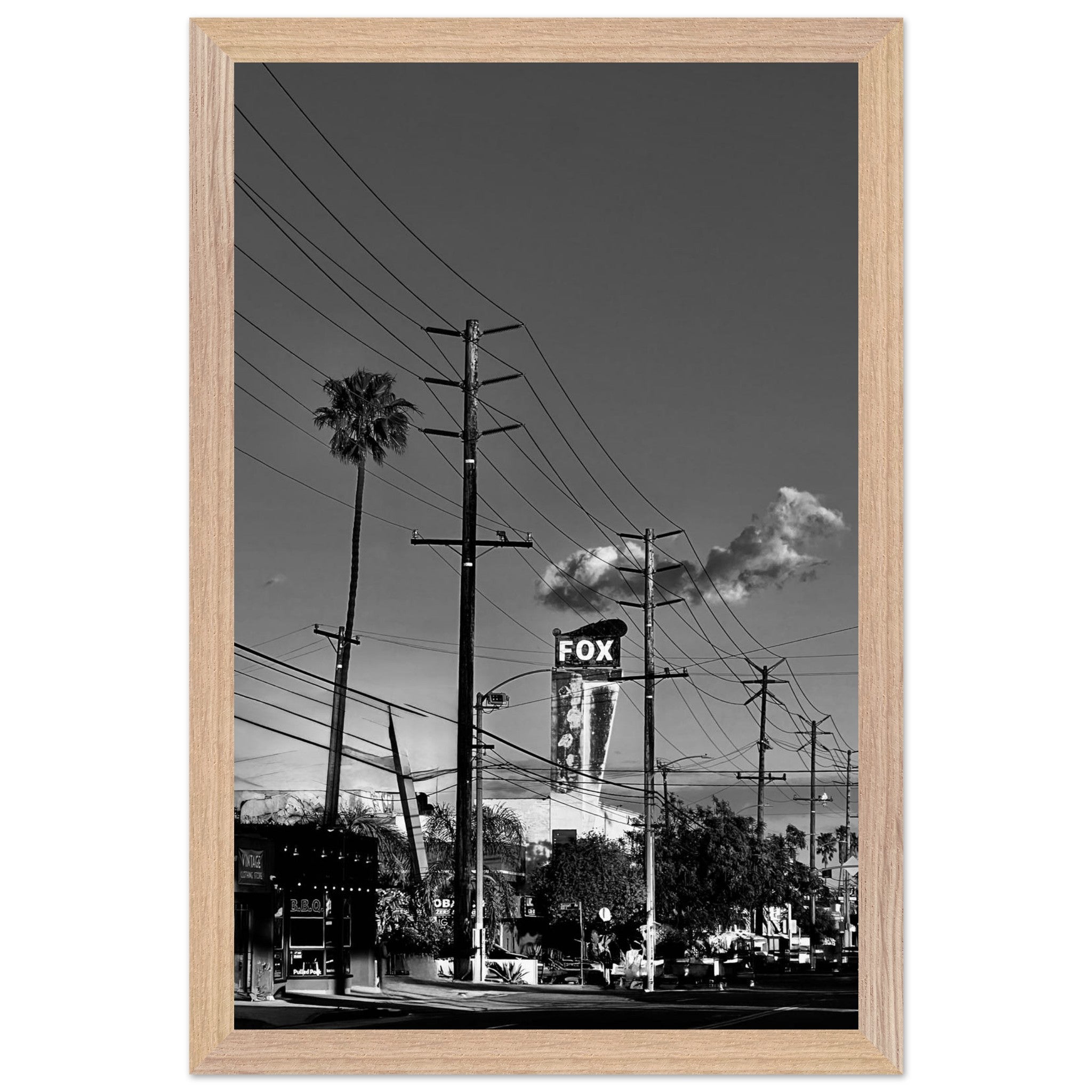 Natural wood-framed semi-glossy poster of iconic LA Westside Road, elegant black and white California wall art print.