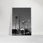 Natural wood-framed semi-glossy poster of iconic LA Westside Road, black and white California wall art print.