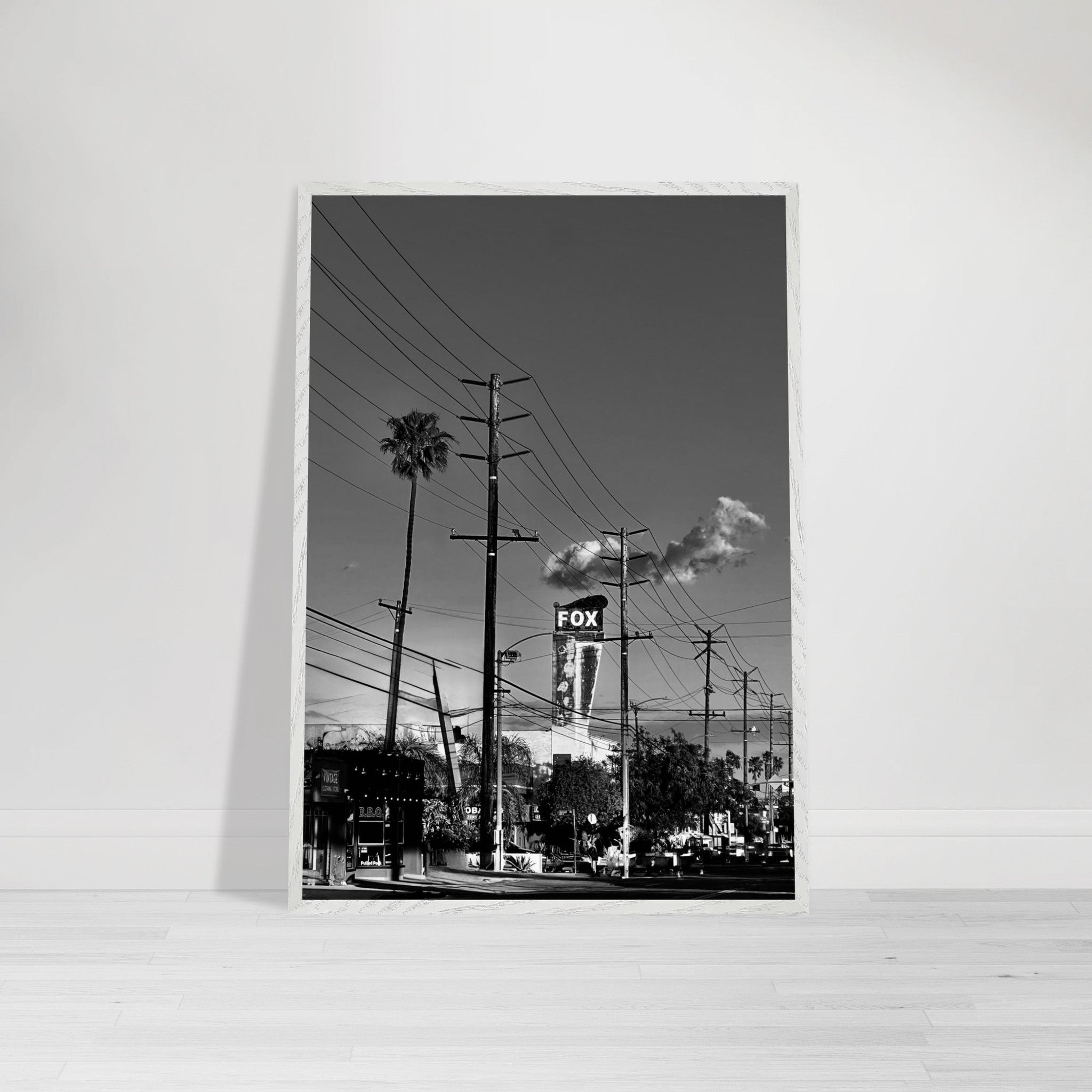 Natural wood-framed semi-glossy poster of iconic LA Westside Road, black and white California wall art print.