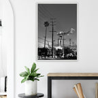 Natural wood-framed semi-glossy poster of iconic LA Westside Road, elegant black and white California wall art print.